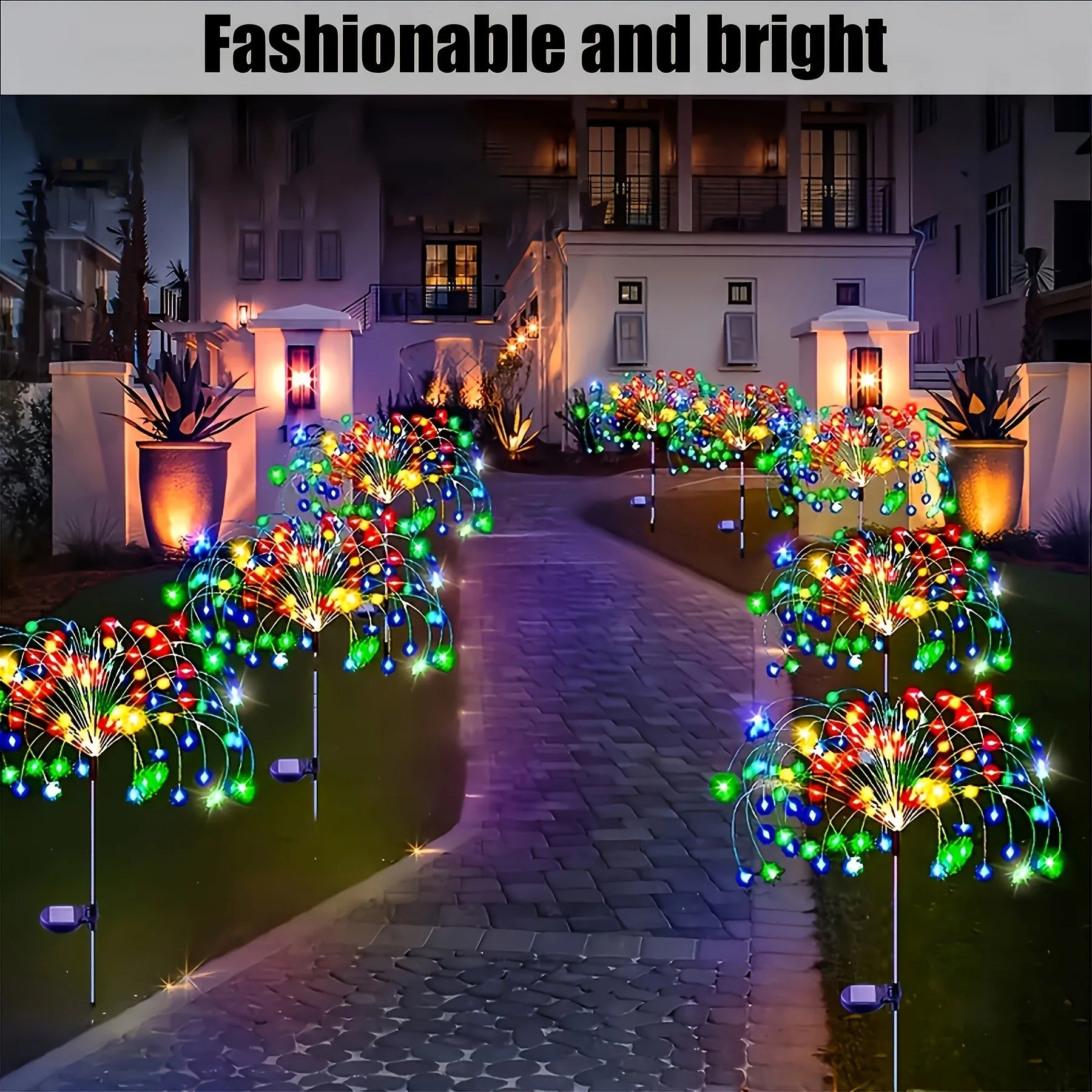 Solar firework garden lights with remote control showing 200 LED burst display outdoors